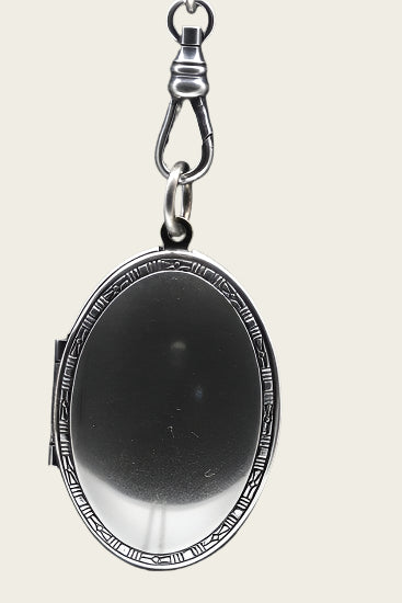 Foto medaillon Ovaal met bewerkte rand 2 foto's ketting hanger zwaar verzilverd