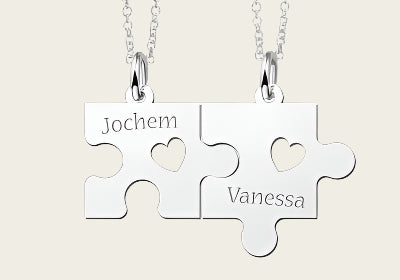 Zilveren graveerplaatje breekhanger Puzzelstukjes met hartje ketting hanger