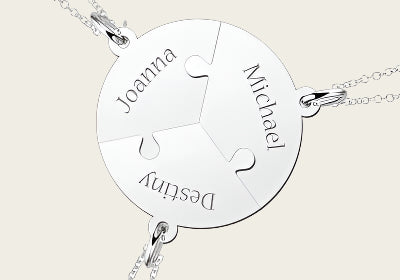 Zilveren graveerplaatje breekhanger Puzzelbol trio ketting hanger