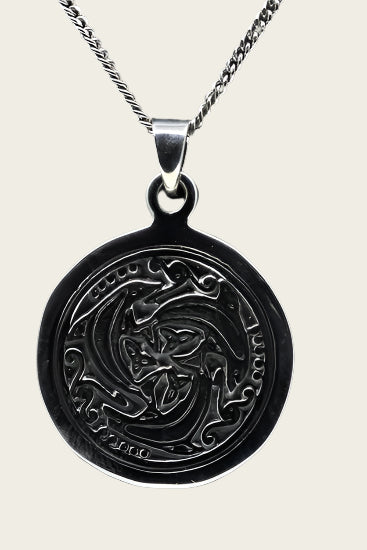 Silver Dolphins trio in round necklace pendant