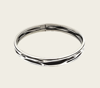 Zilveren kreukelarmband met vrije banen 21 cm