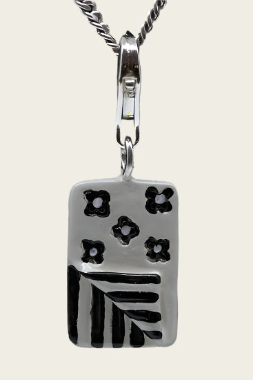 Silver Sleeping Bag black/white pendant and/or charm