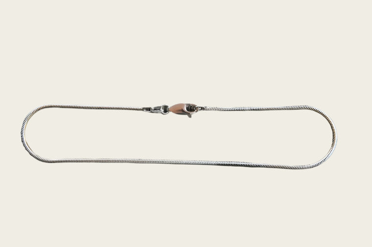 Zilveren enkelketting slang